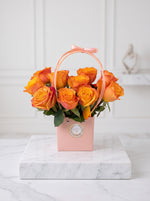 Load image into Gallery viewer, Orange Rose Handbag Arrangement